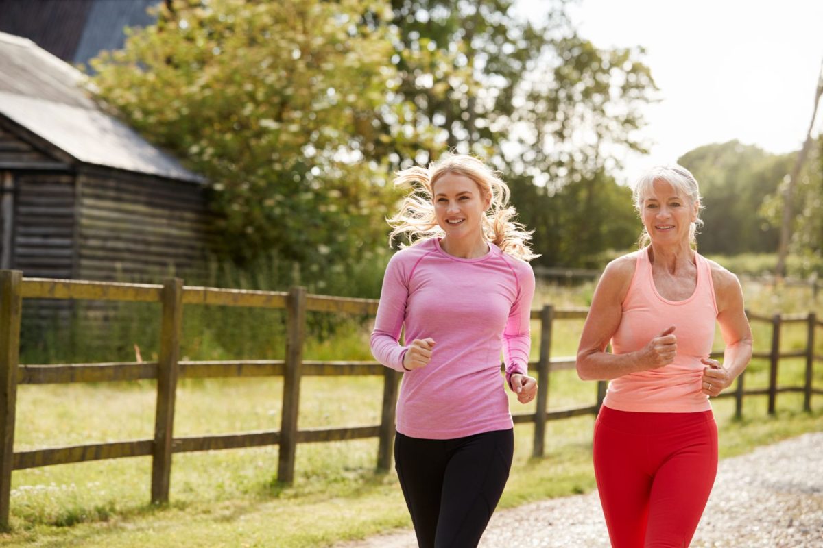 women running countryside scaled